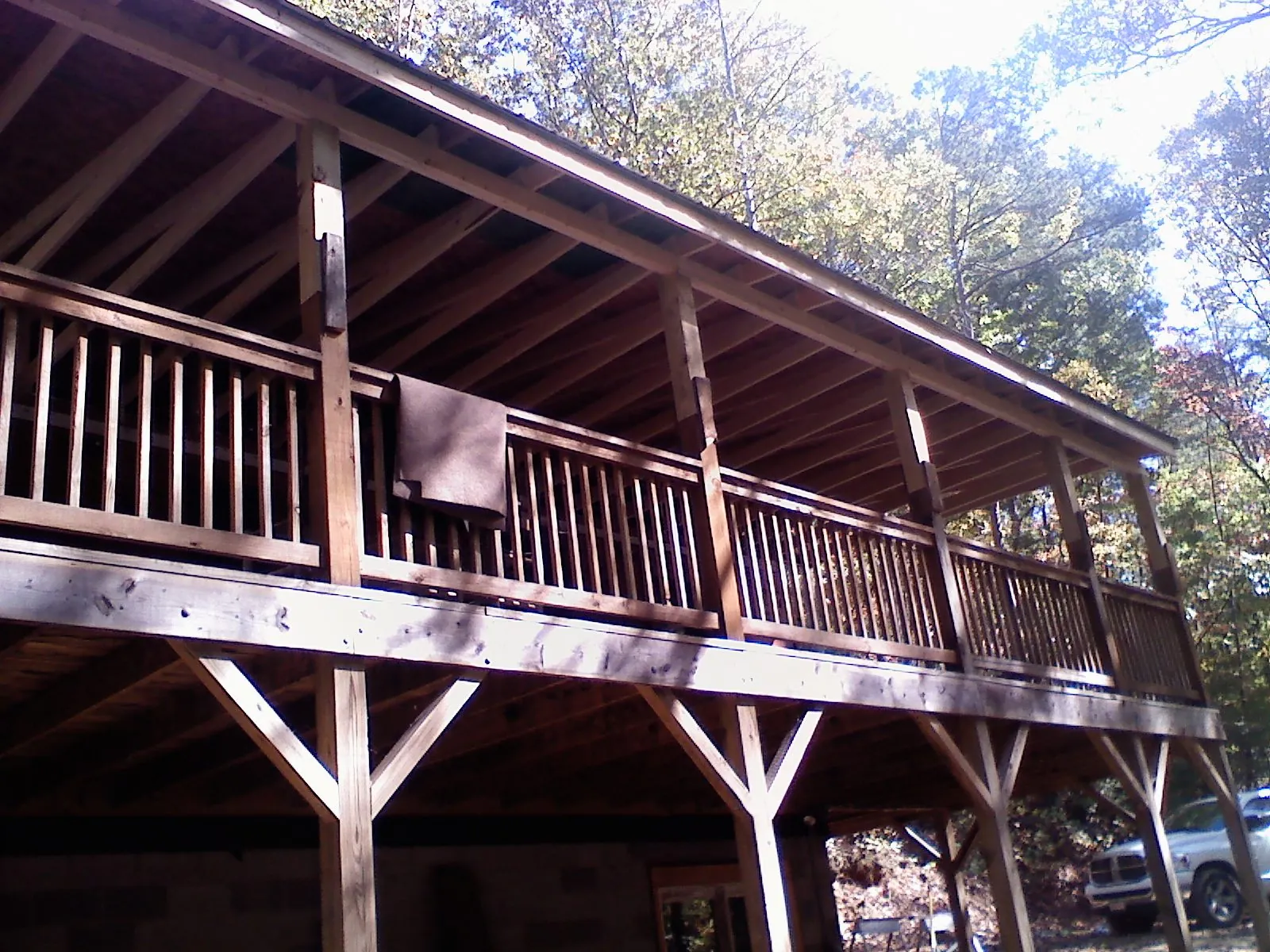 Timber framing under a new elevated porch and deck — Roof Leak Repair in Gilbertsville by Roofing Brothers